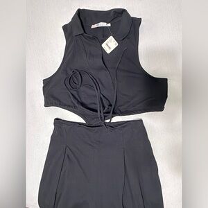 NWT FREE PEOPLE Beach One piece vest/pant
Size XL Black